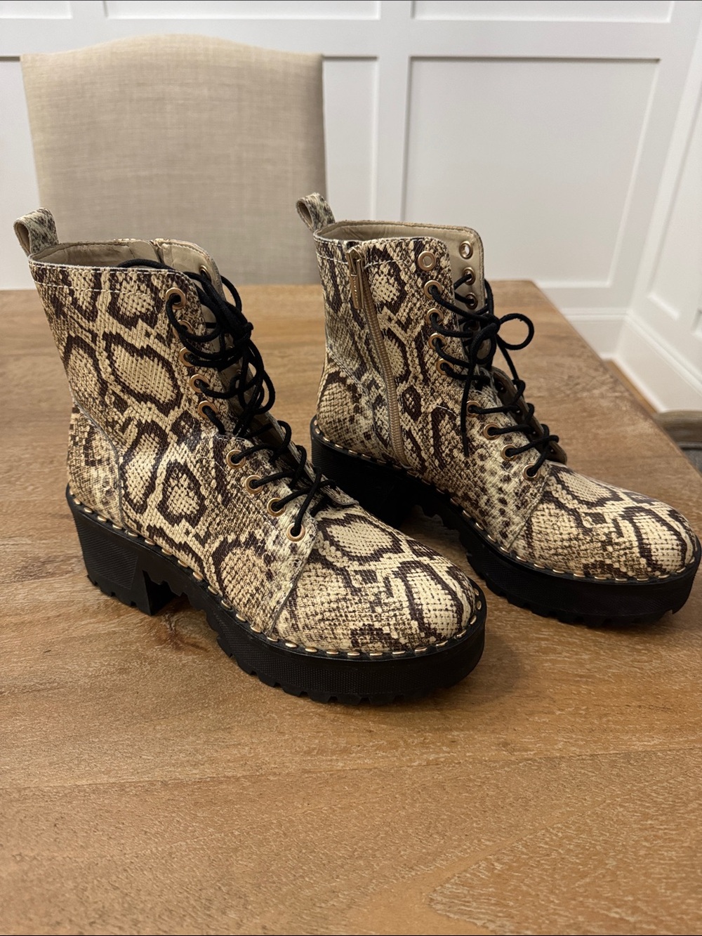 Vince Camuto Snake-Print Lace-Up Platform Boots with gold accents